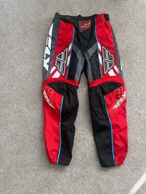 Red and Black Motocross Pants with Blue Accents